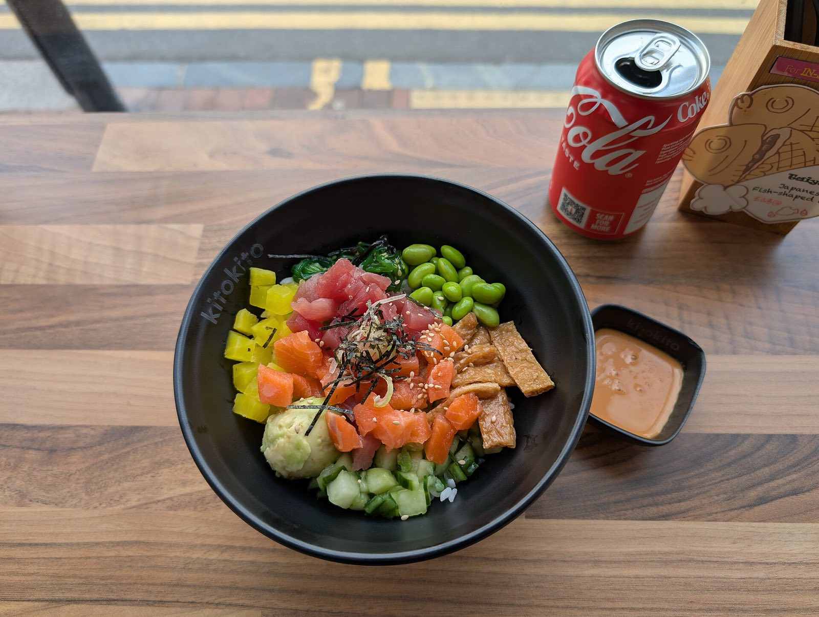 Salmon and tuna poke bowl with spicy mayo